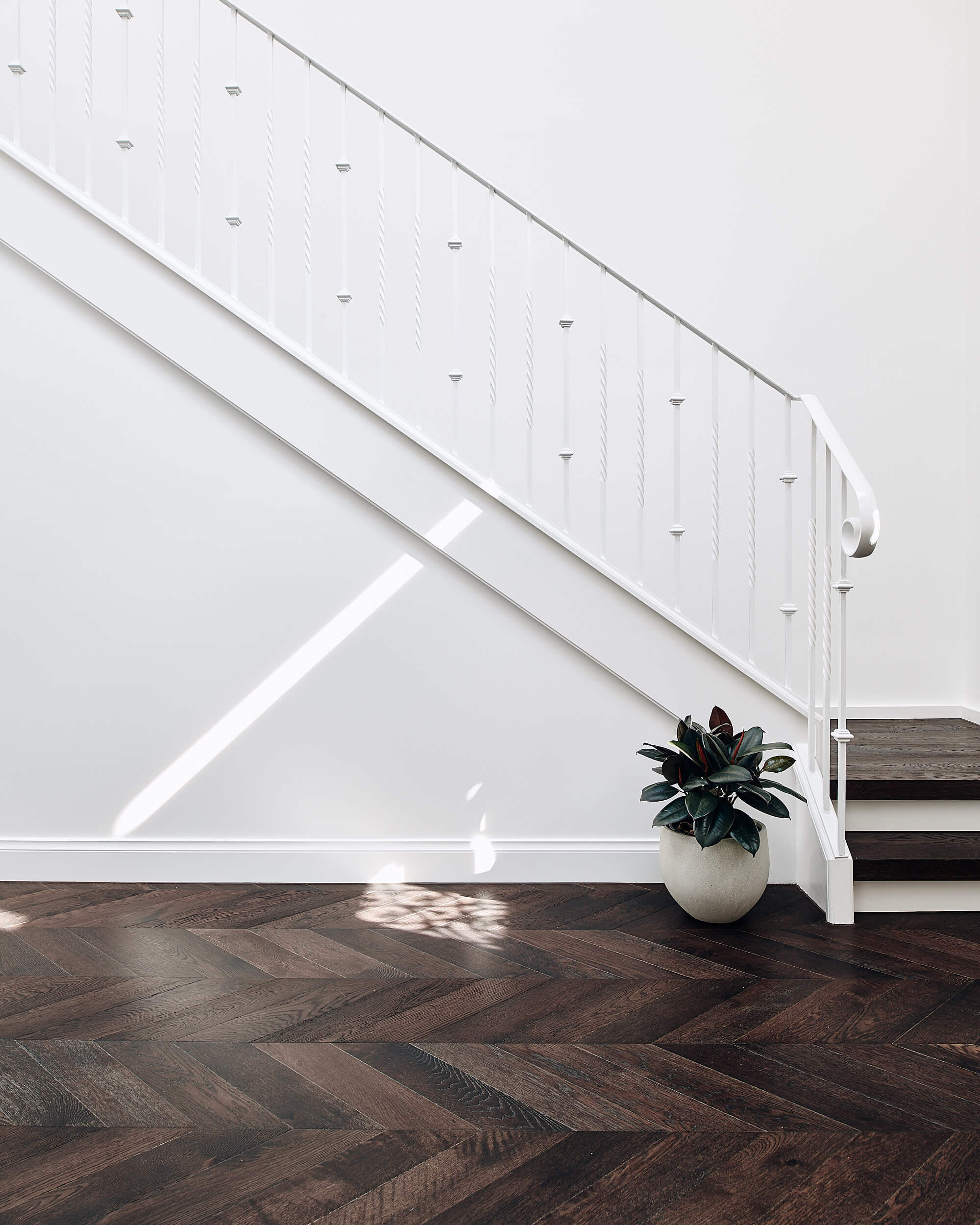 monochrome interior design with dark timber floors