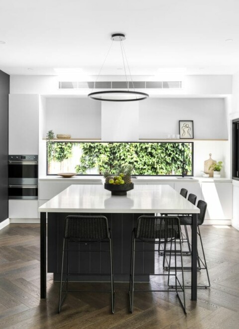 Dark color timber flooring in kitchen