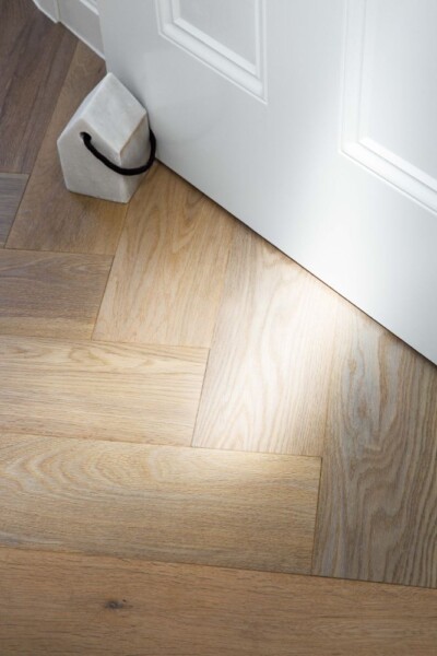 Brown herringbone timber flooring