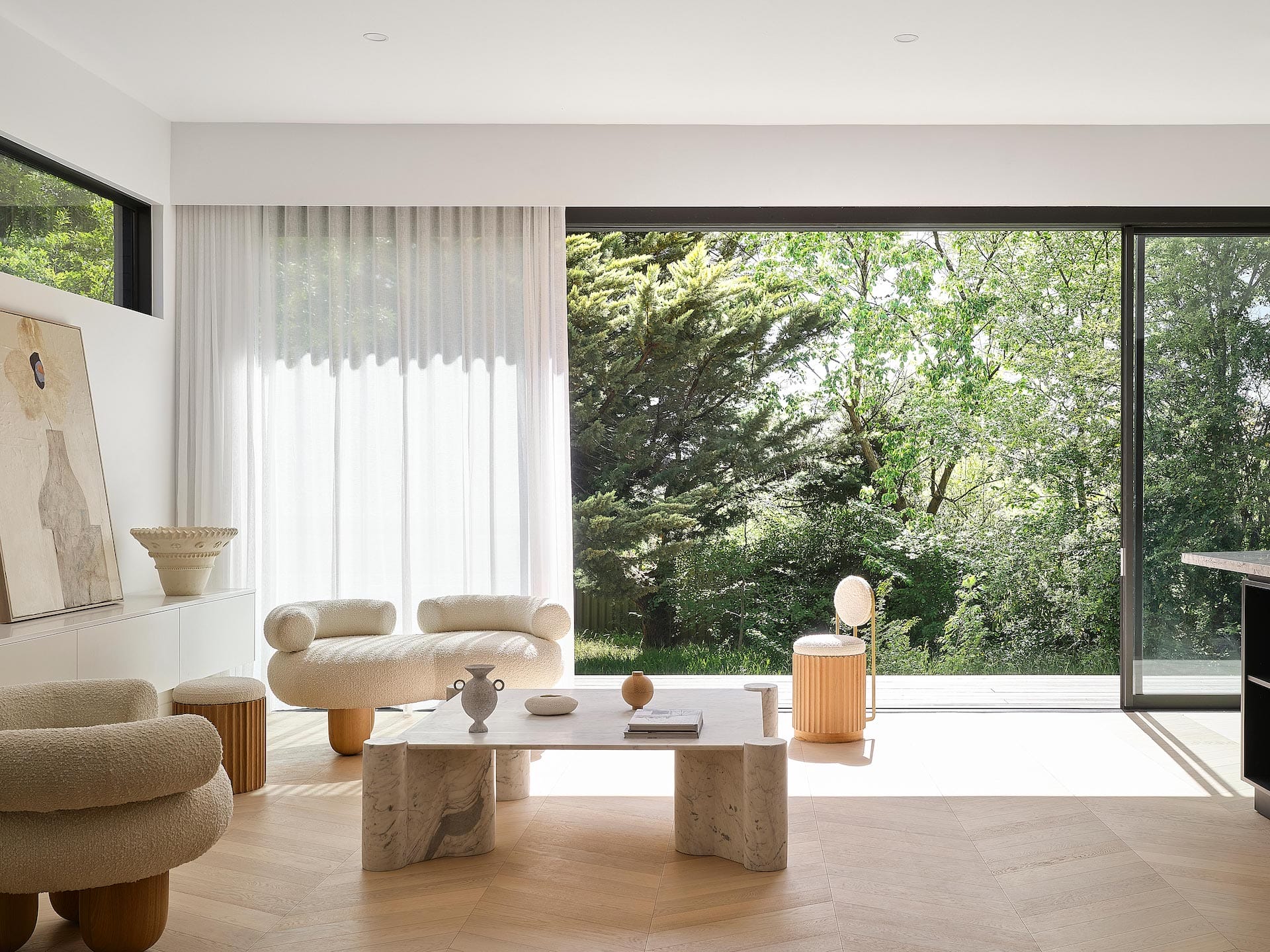 Japandi-style living room with textured armchairs
